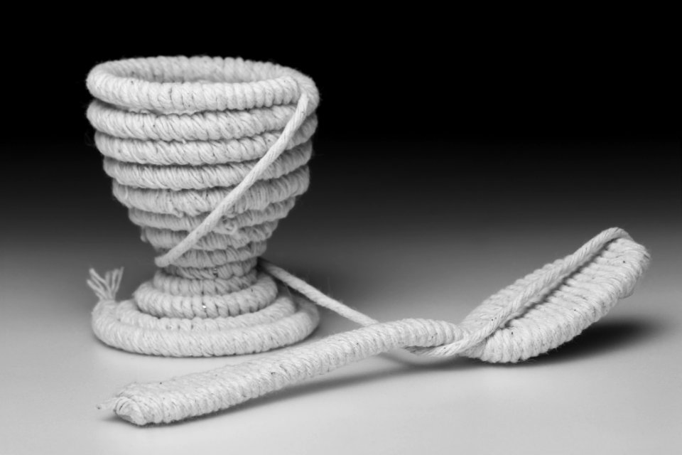 eggcup and spoon wrapped in string