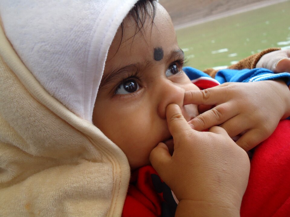 Kid face fingers