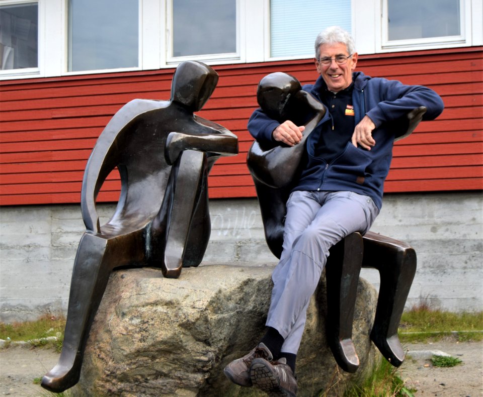 Greenland. Sisimiut. David sitting on a bronze.