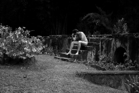 Stone staircase thinker by rodin naked man