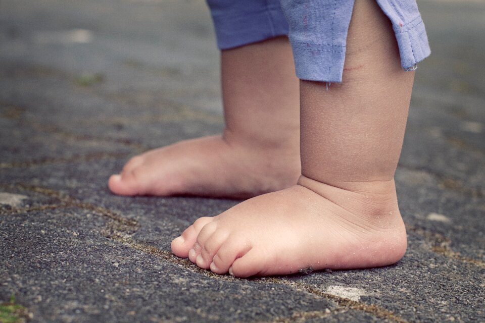 Barefoot human child