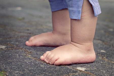 Barefoot human child photo