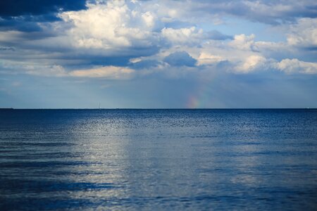 Clouds rainbow water