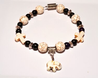 Cross elephant beads