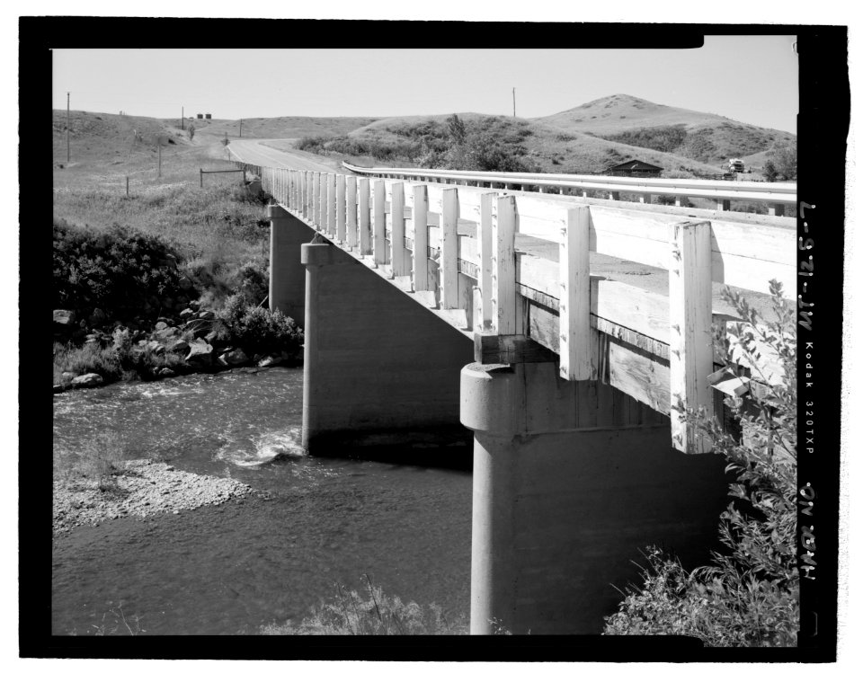 Three-quarters view; northeast side; view to south. - Belt Creek Bridge, Spanning Belt Creek on Highway 288, Waltham, Chouteau County, MT HAER MT-125-7