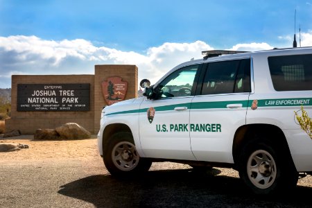 Park Ranger vehicle by the North Entrance Sign