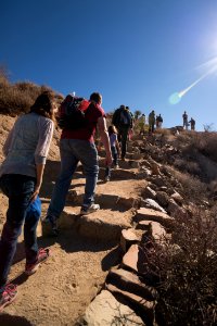 Visitors on a Ranger-guided Hike Head Up the Mastodon Peak Trail