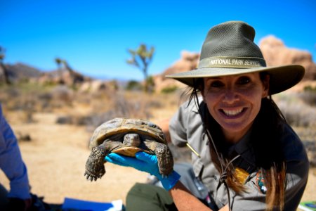 Ranger smiling with tortoise