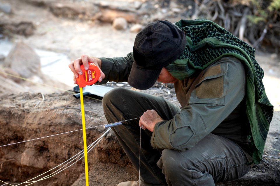 Park staff performing archaeology surveys at Cottonwood Springs