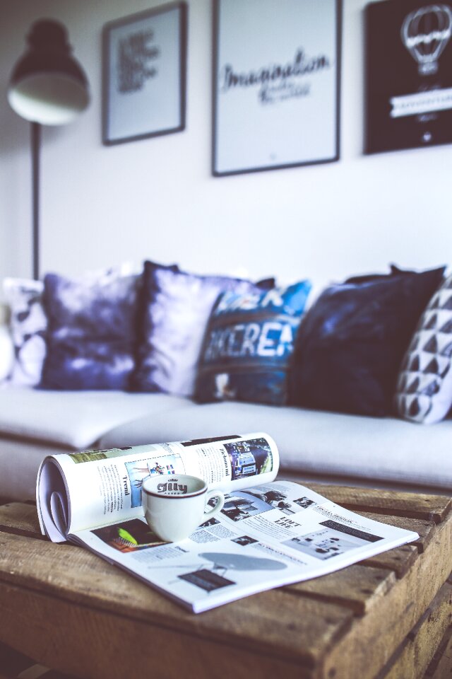 Reading magazine paper