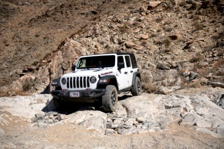 Jeep navigating a rock waterfall on Pinkham Canyon Road