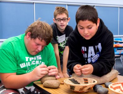 GATE (Gifted and Talented Education) students grind acorns photo