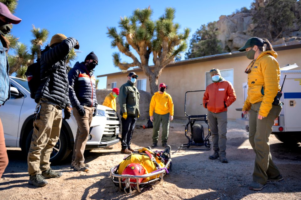 Joshua Tree Search and Rescue team members training on litter carries photo