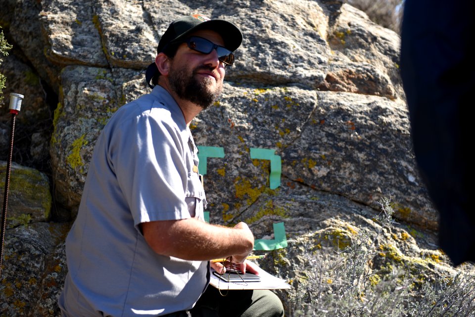 Biologist Neil Frakes speaking to students