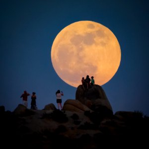 Full Moon, Rocks and People
