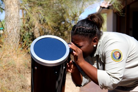 Volunteer and SunscopeMoon Scope at the Night Sky Festival