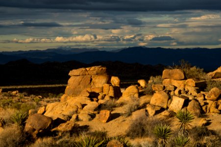 Boulders Glow with Clouds in the Distance photo