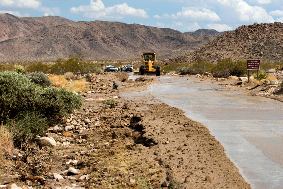Removing debris from road after flooding, 8/26/15 (near North Entrance)