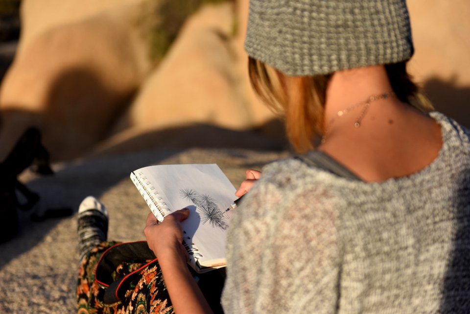 Artist sketching at Skull Rock