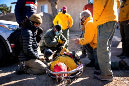 Joshua Tree Search and Rescue team members training on litter carries photo