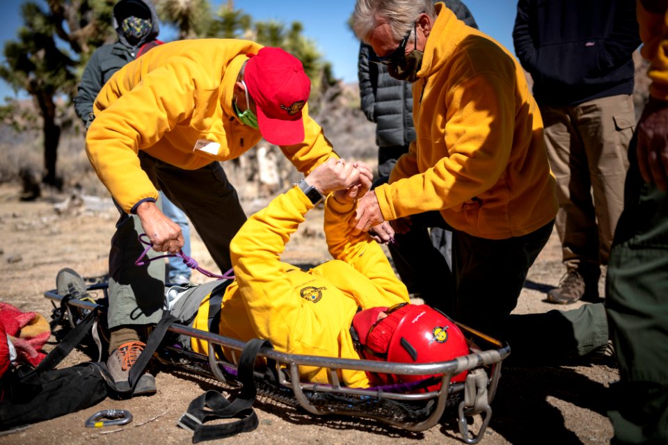 Joshua Tree Search and Rescue team members training on litter carries photo