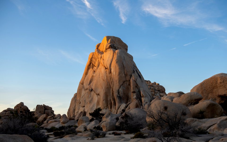 Boulder and setting sun