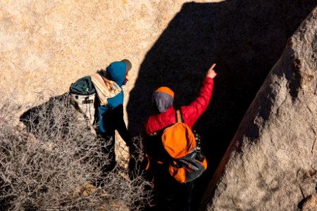 Climbers navigating an approach trail