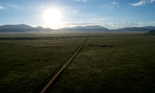 the Sun and the Dirt Road in the Middle of Nowhere photo