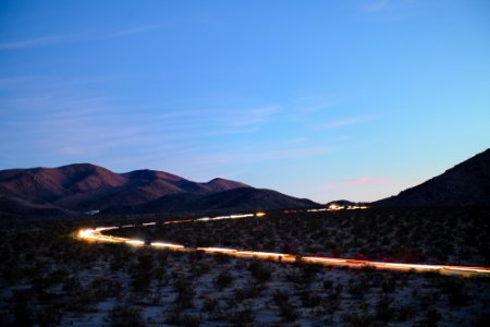 Headlights of cars exiting the park near North Entrance photo