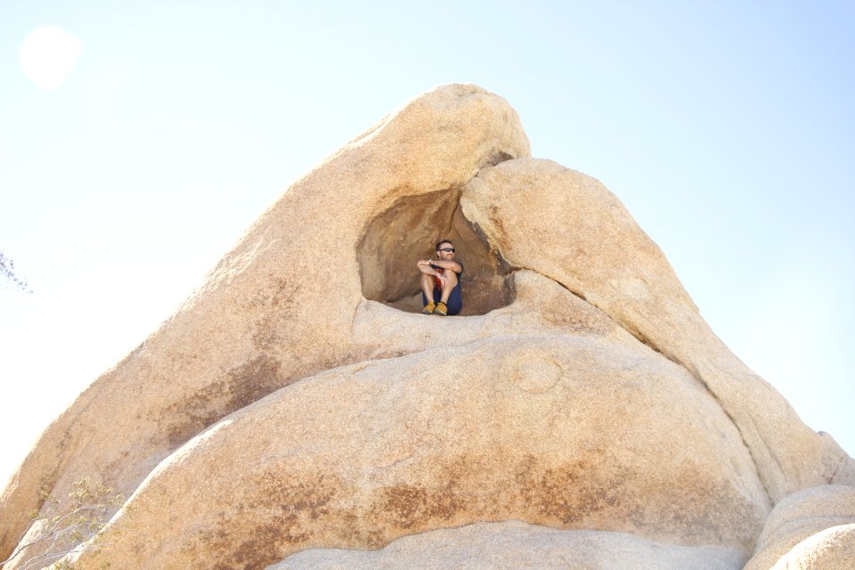 Visitor in rock cavity