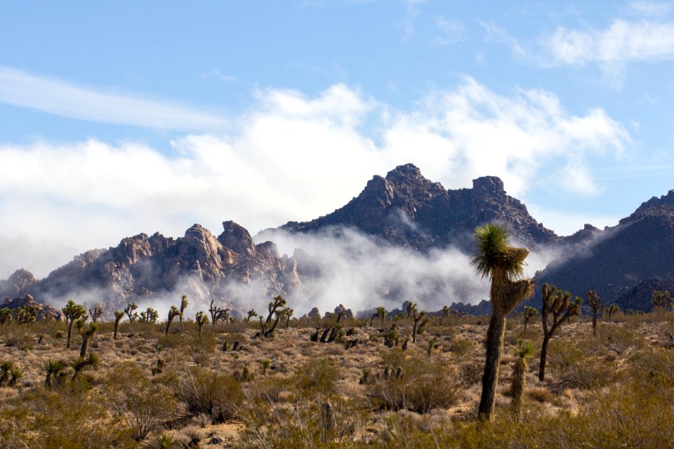 Clouds break near the park's West Entrance