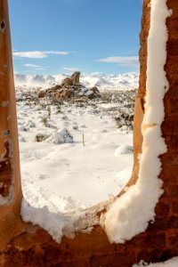 Headstone through Ryan Ranch in the snow photo