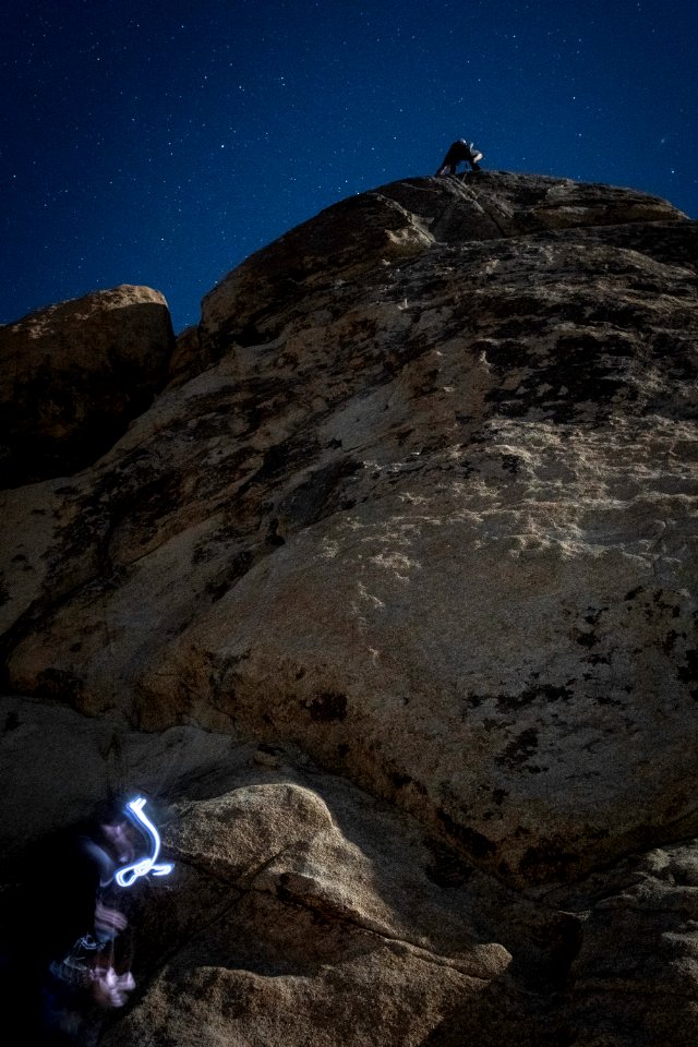 Climber and belayer with headlamps