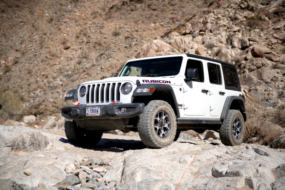 Jeep navigating a rock waterfall on Pinkham Canyon Road