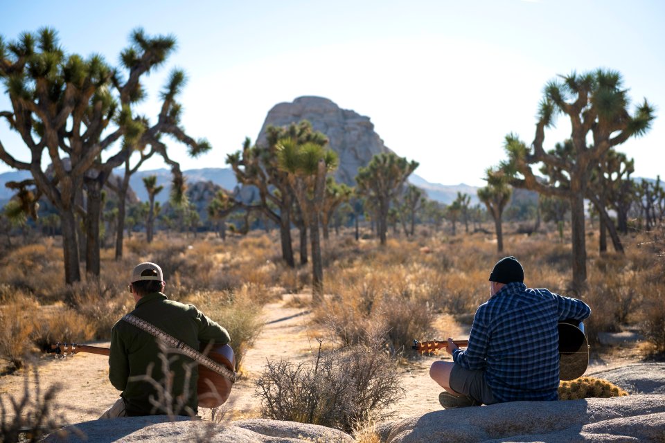 Two guitar players near Intersection Rock