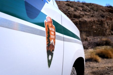 NPS arrowhead on a park ranger vehicle photo