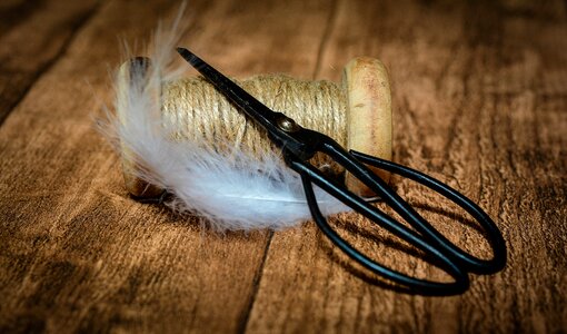 Old scissors yarn feather photo
