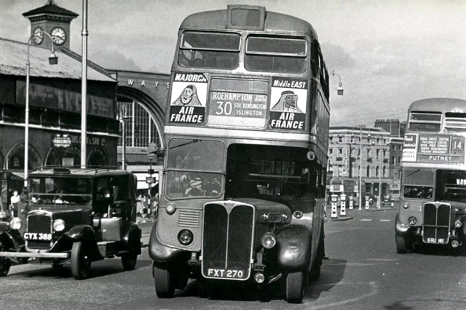 Euston Road-RT95 & RT2232 & a Morris Oxford taxi in the Austin lookalike style of the 1930s.