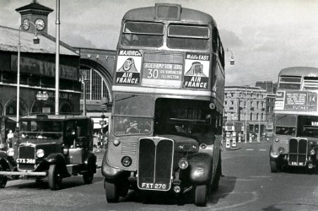 Euston Road-RT95 & RT2232 & a Morris Oxford taxi in the Austin lookalike style of the 1930s. photo
