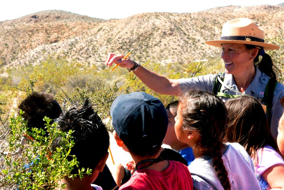 Ranger talking to students