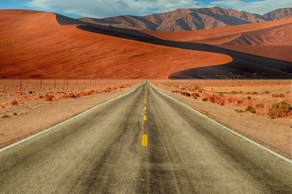 Mountains straight road desert road