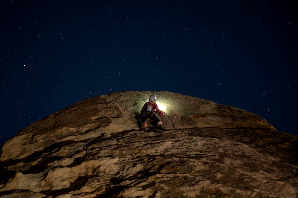 Climber with headlamp