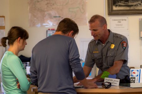 Ranger Keith Flood Helps Visitors at Cottonwood Visitor Center