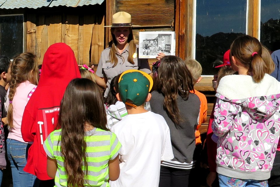 Kids on a Field Trip Eagerly Gather Around Ranger Sarah Jane Pepper at Keys Ranch