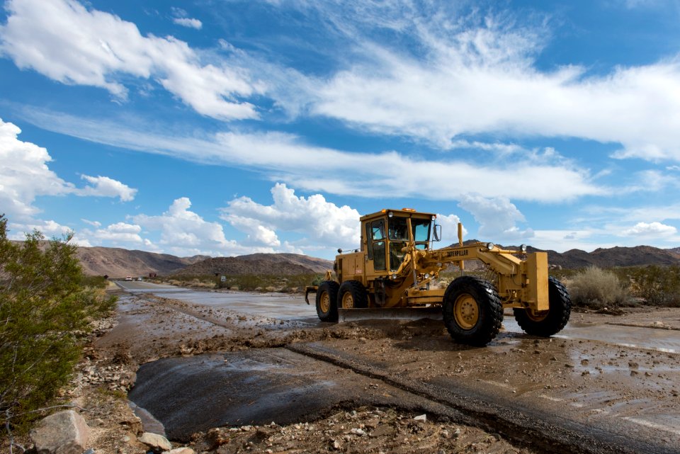 Removing debris from road after flooding, 8/26/15 (near North Entrance)