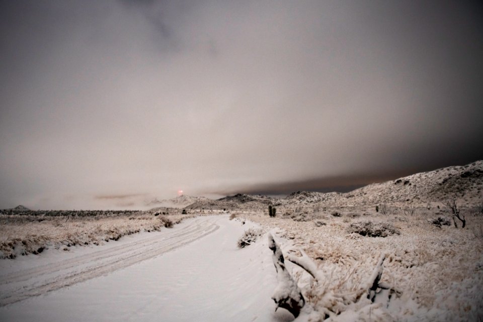 Mist over snow-covered mountains at Covington Flats