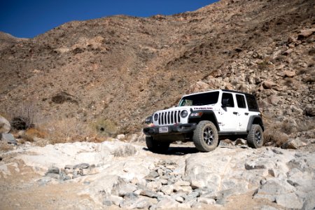 Jeep navigating a rock waterfall on Pinkham Canyon Road