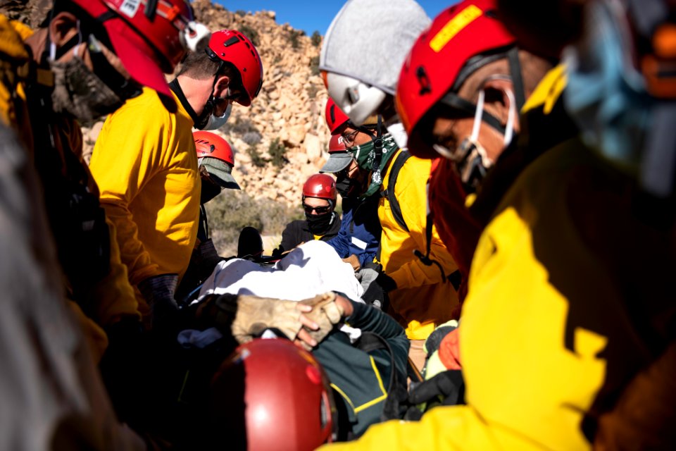Joshua Tree Search and Rescue team members training carrying a litter