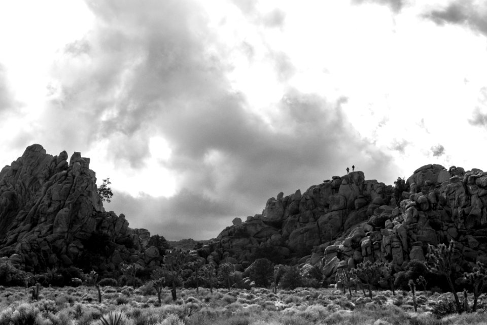 Storm clouds and hikers near Hemingway Buttress