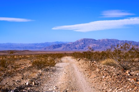 Black Eagle Mine Road with Pinto Mountains in the distance photo